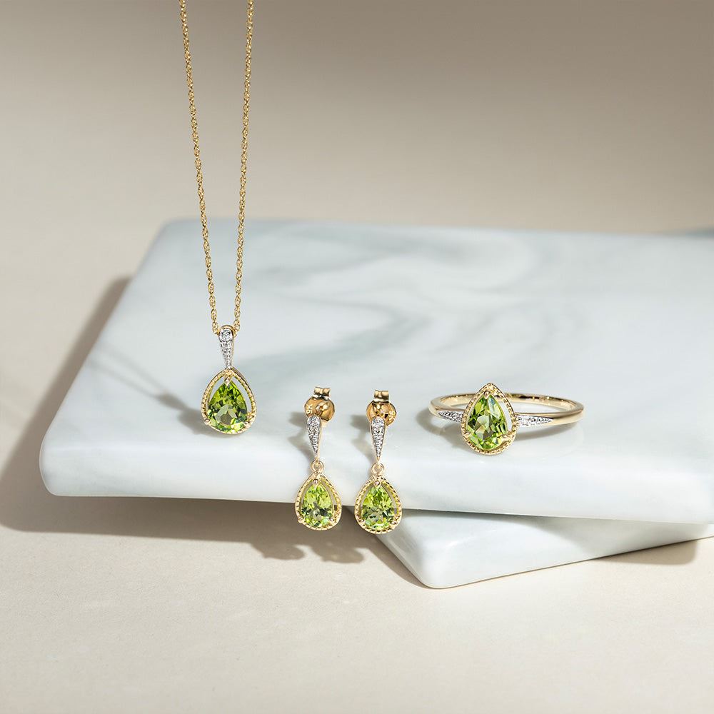 Klassische Tropfenohrringe mit Peridot und Diamanten aus 9 Karat Gelbgold